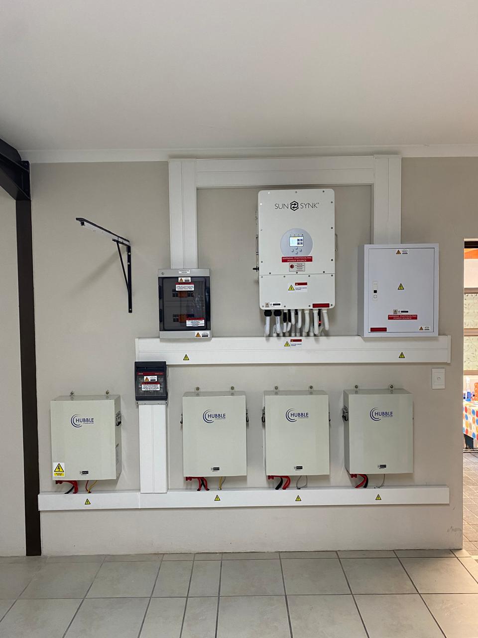 Wall-mounted inverter & battery bank — Stephensons Electrical
